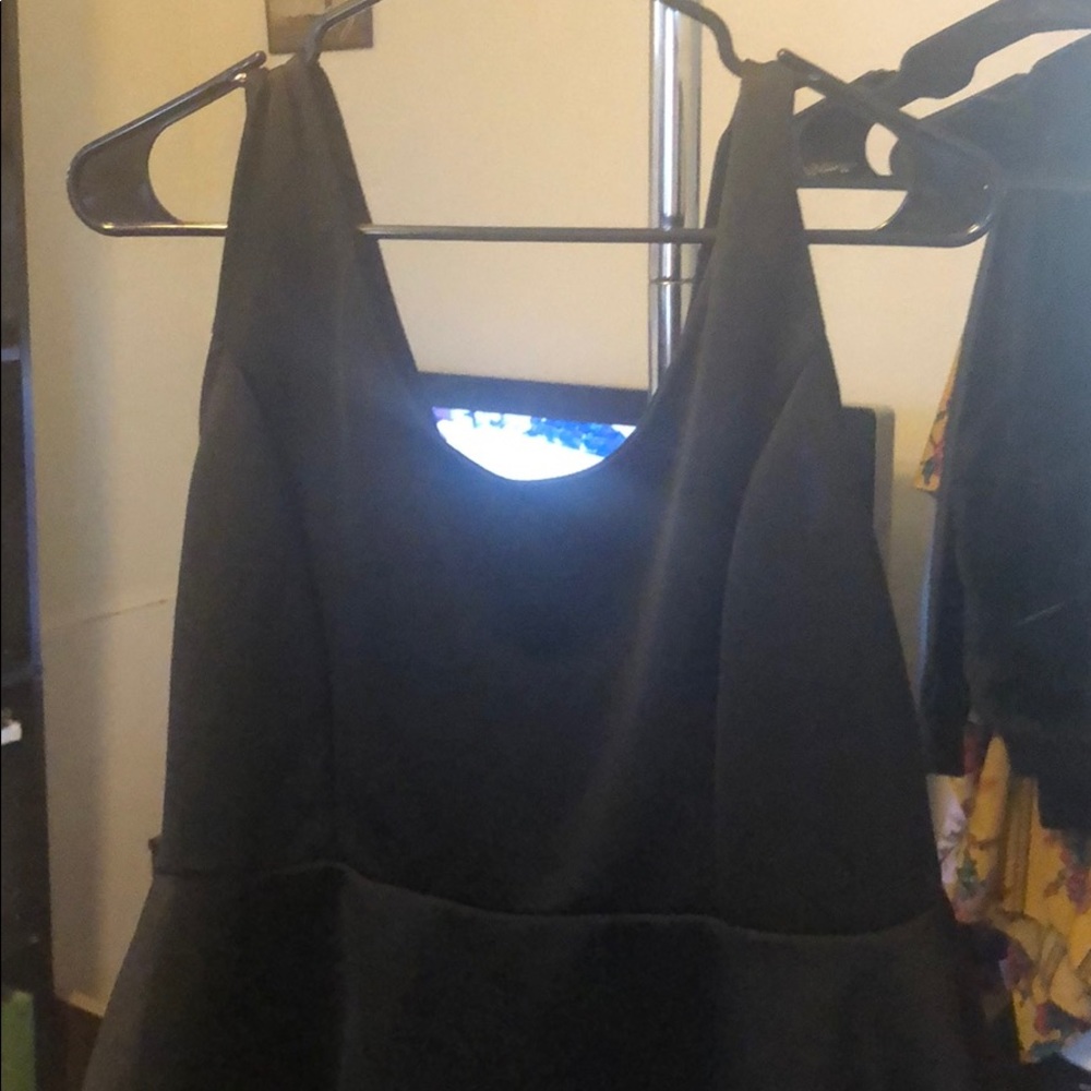 Sleeveless peplum top